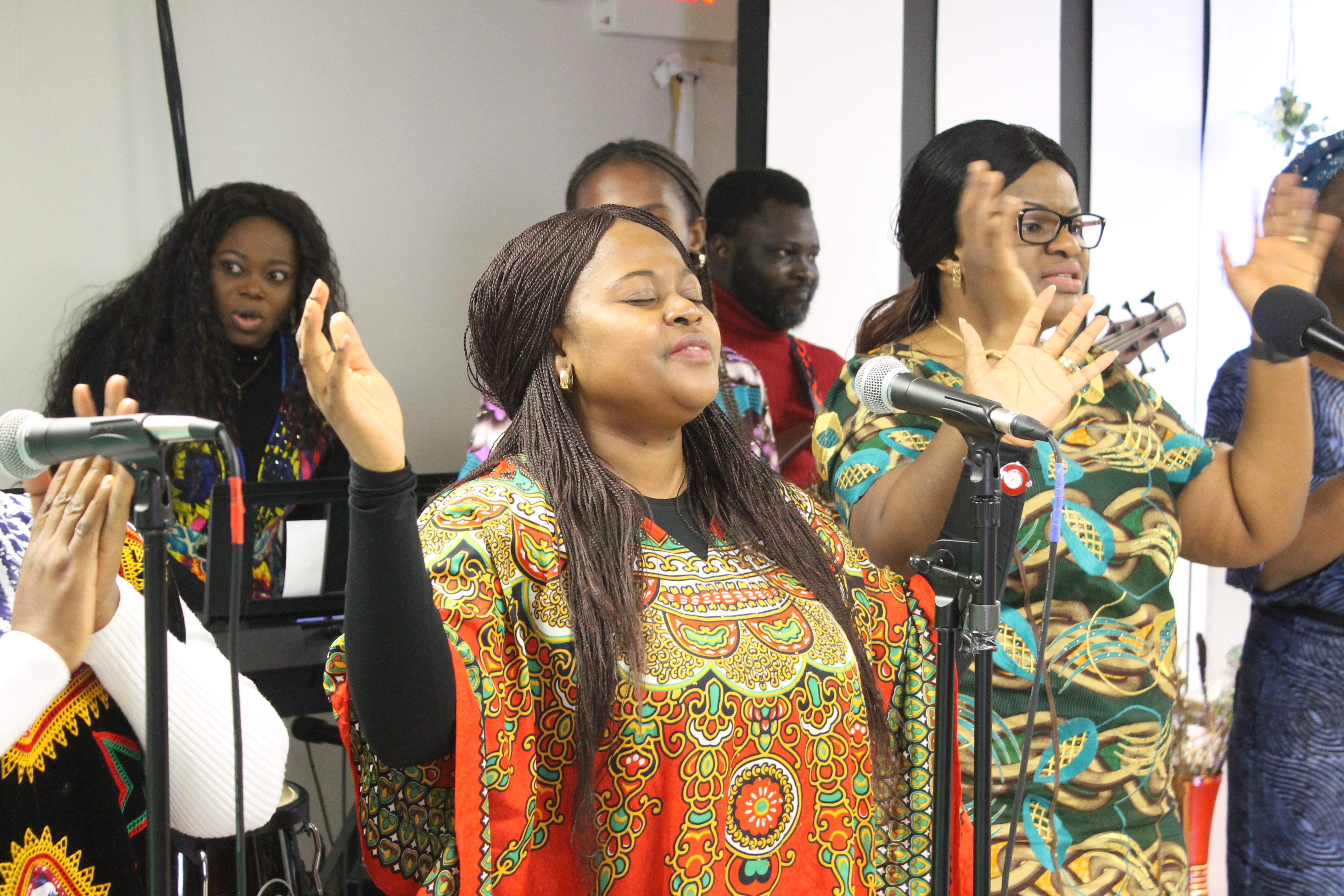 Faith Chapel women in prayer and worship